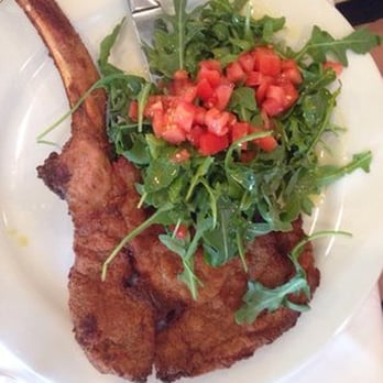 Basilico Ristorante - Scalopine di Vitello alla Milanese con Insalata di Rugola e Balsamico= Panfried Veal Topped with Arugula and Cherry tomato salad - Italian Near Me - Doral, Florida Basilico Ristorante - Scalopine di Vitello alla Milanese con Insalata di Rugola e Balsamico= Panfried Veal Topped with Arugula and Cherry tomato salad - Italian Near Me - Doral, Florida