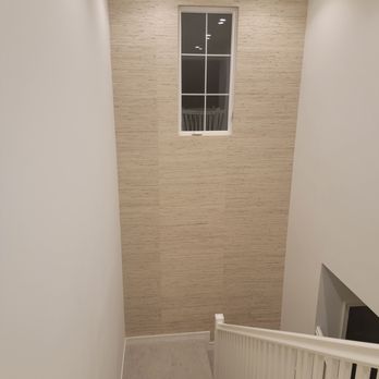 PD&G Wallcover - Real Grasscloth installed on 16 foot accent wall on Stairs - Wallpapering Near Me - San Clemente, California