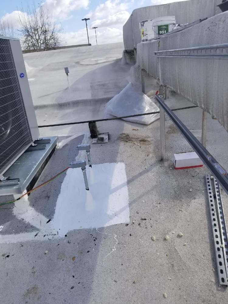 Slide of Huncho Roofer