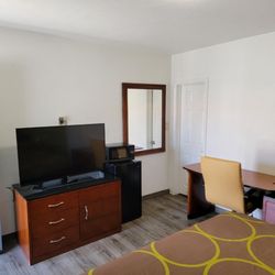 Super 8 by Wyndham El Centro North - ROom Amenities T.V. with Table and CHair for Desk