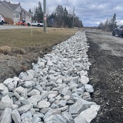 Down 2 Dig Excavation - Ditching with rock lining