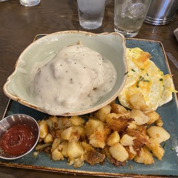 First Watch - Biscuits and turkey sausage gravy with home fries and scrambled eggs with cheddar cheese - Breakfast & Brunch Near Me - Cincinnati, Ohio