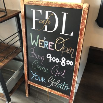 Fior di Latte - Sandwich board inside with business hours~ - Cafes Near Me - Burnaby, British Columbia