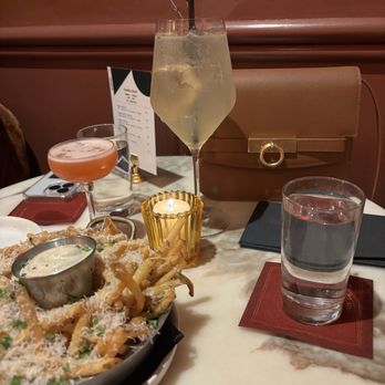Bar Bonobo - Truffle fries Limoncello spritz - Cocktail Bars Near Me - New York, New York Bar Bonobo - Truffle fries Limoncello spritz - Cocktail Bars Near Me - New York, New York