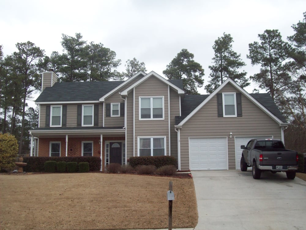 Slide of T&T Roofing and Repair