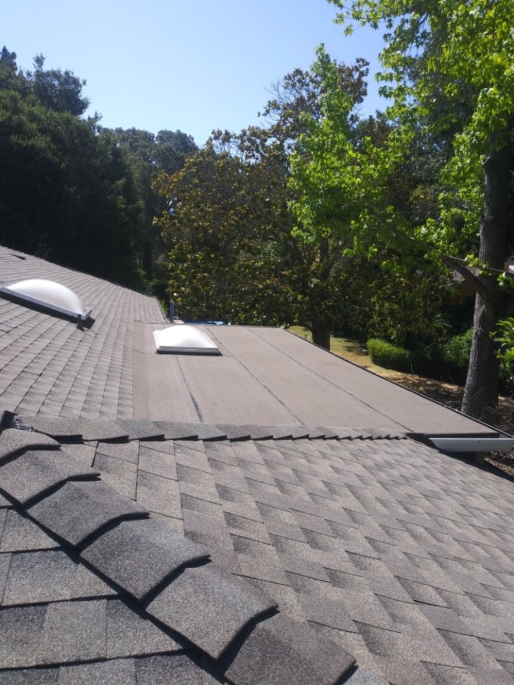 Slide of AG Roofing Repairs