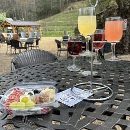 Mimosa wine flight and 2 cheese charcuterie board