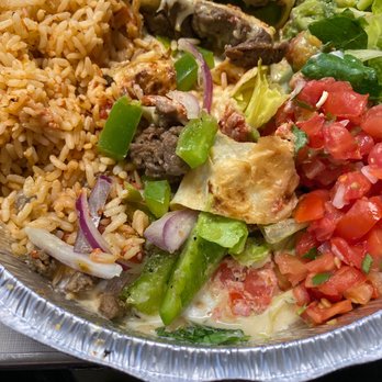 Willy's Mexicana Grill - Uncooked "sautéed" green peppers and onions burrito. - Mexican Near Me - Alpharetta, Georgia