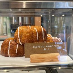 three donuts in a display case