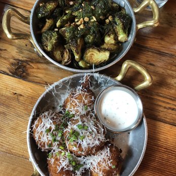 Eureka! - Mac N' Cheese Balls and Crispy Glazed Brussels Sprouts - American Near Me - Austin, Texas Eureka! - Mac N' Cheese Balls and Crispy Glazed Brussels Sprouts - American Near Me - Austin, Texas