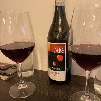 Spaghetti Western - a bottle of wine and two glasses of wine - Italian Near Me - Fargo, North Dakota Spaghetti Western - a bottle of wine and two glasses of wine - Italian Near Me - Fargo, North Dakota