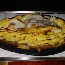 Mon Ami Pizzeria Restaurang - En fisk planka.