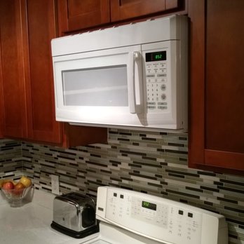 Fix Cut Haul - The bottom of the upper cabinets are 5' off the ground. The bottom of the microwave is 5.5' off the ground. Unbelievable! - Demolition Services Near Me Fix Cut Haul - The bottom of the upper cabinets are 5' off the ground. The bottom of the microwave is 5.5' off the ground. Unbelievable! - Demolition Services Near Me