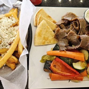 Samos Greek Island Grill - Gyro platter with grilled veggies and greek fries - Greek Near Me - Baltimore, Maryland Samos Greek Island Grill - Gyro platter with grilled veggies and greek fries - Greek Near Me - Baltimore, Maryland