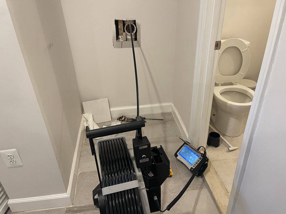 Slide of Clogrooter Services