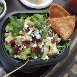 Arugula & Endive Salad  with dried apple chips, pumpkin seeds, craisins, chopped pecans & goat cheese crumbles.