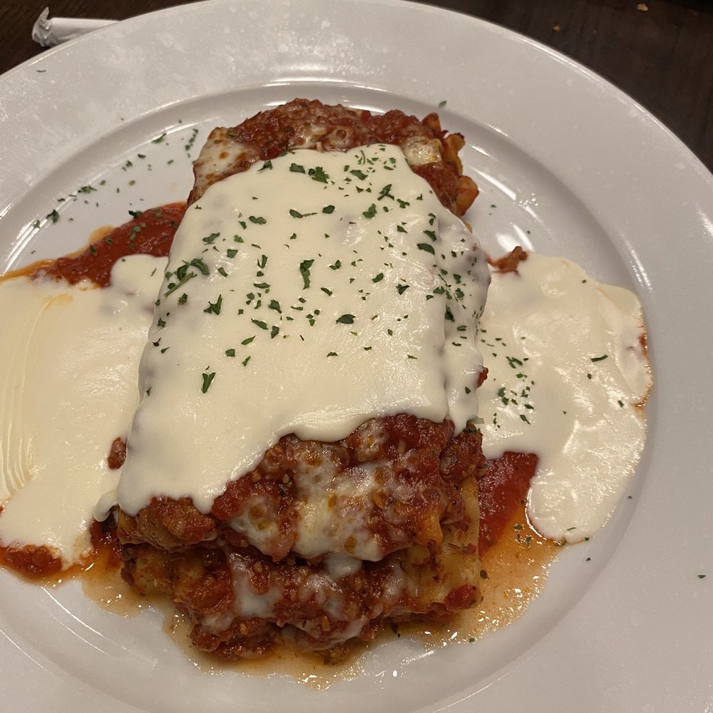 Vino's Italian Steakhouse - Beef Lasagna with a delicious béchamel sauce - Steakhouses Near Me - Thackerville, Oklahoma Vino's Italian Steakhouse - Beef Lasagna with a delicious béchamel sauce - Steakhouses Near Me - Thackerville, Oklahoma