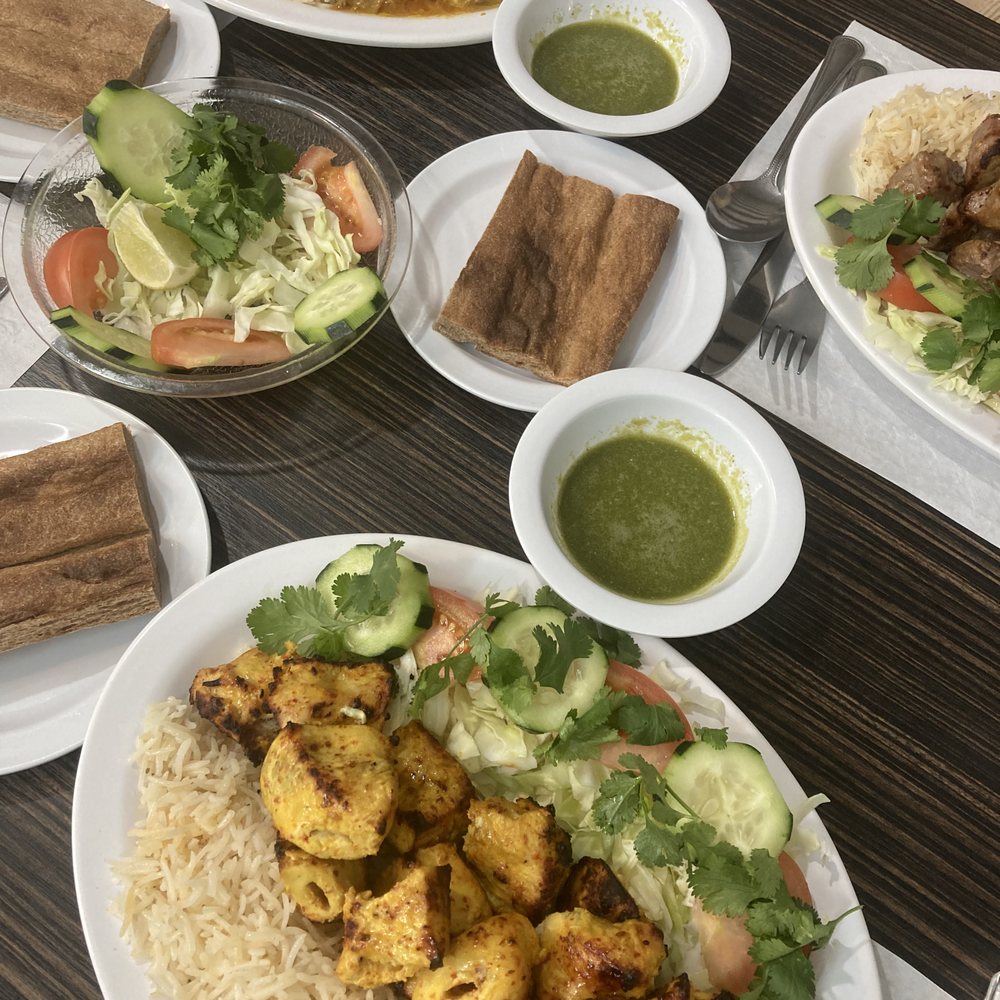 Chicken Kabob (front), Teka Kabob (right), Banjan Burani (back) Chicken Kabob (front), Teka Kabob (right), Banjan Burani (back)
