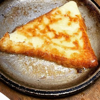 Hellas Restaurant - Saganaki (flaming cheese) - Bakeries Near Me - Tarpon Springs, Florida Hellas Restaurant - Saganaki (flaming cheese) - Bakeries Near Me - Tarpon Springs, Florida