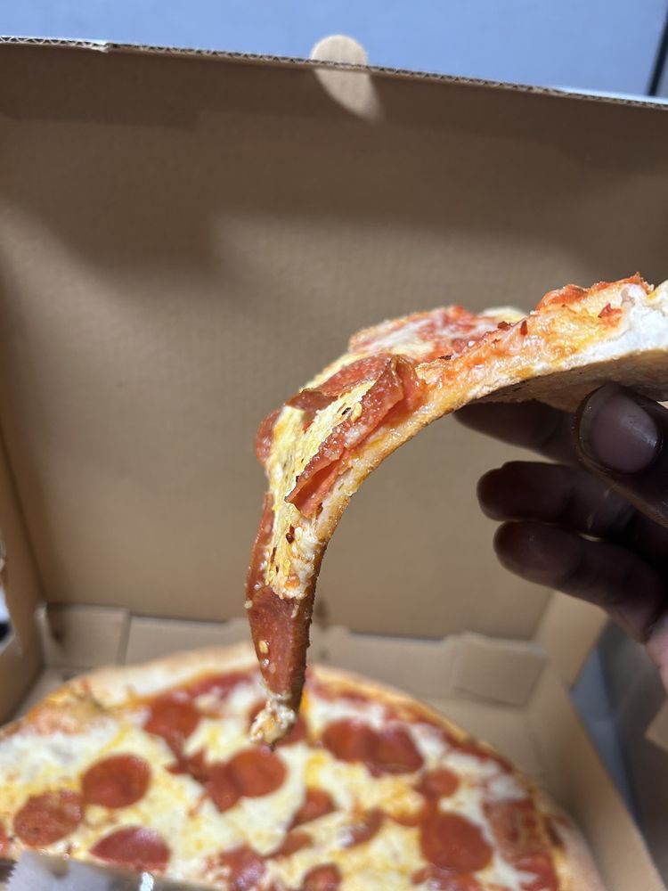 Lutinas Pizza and Subs Logo