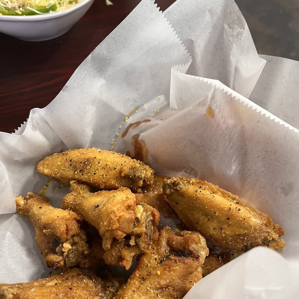 301 Wingz - a bowl of coleslaw and a bowl of salad - New American Near Me - Fayetteville, North Carolina