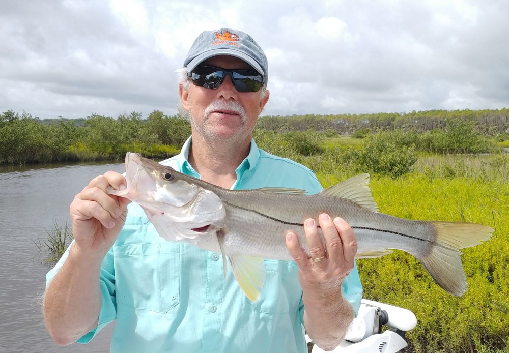 Xscape Fishing Logo