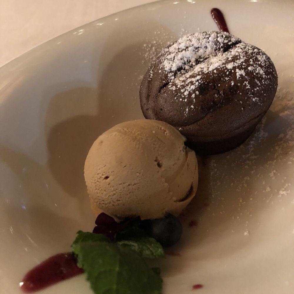 Hiervabuena - Chocolate molten lava cake with praline ice cream, house made. Perfect ending to a perfect meal. - Spanish Near Me - Toledo, TO Hiervabuena - Chocolate molten lava cake with praline ice cream, house made. Perfect ending to a perfect meal. - Spanish Near Me - Toledo, TO