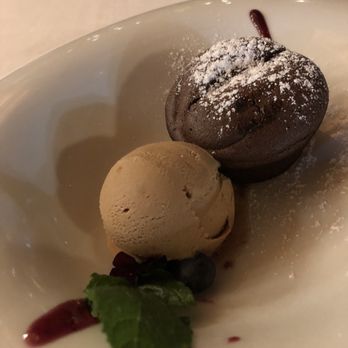 Hiervabuena - Chocolate molten lava cake with praline ice cream, house made. Perfect ending to a perfect meal. - Spanish Near Me - Toledo, TO Hiervabuena - Chocolate molten lava cake with praline ice cream, house made. Perfect ending to a perfect meal. - Spanish Near Me - Toledo, TO
