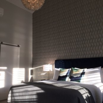 Olea Hotel - Room #15 is gorgeous:  high ceilings, immaculate bedding, artful light fixture, and s view of the Sonoma mountain range. - Hotels Near Me - Glen Ellen, California