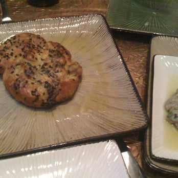 Taxim - Ramp pastry with nigella seeds and feta - Greek Near Me - Chicago, Illinois Taxim - Ramp pastry with nigella seeds and feta - Greek Near Me - Chicago, Illinois
