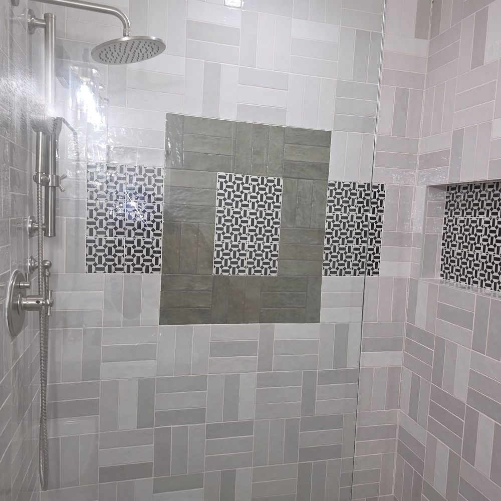 Rona Home Remodeling - Custom tile and addition of shower product nook. Reno of bathtub combo to shower only. - General Contractors Near Me - Los Angeles, California Rona Home Remodeling - Custom tile and addition of shower product nook. Reno of bathtub combo to shower only. - General Contractors Near Me - Los Angeles, California