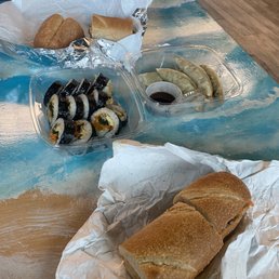 Banh Mi, Kimbap and vegetarian dumplings. Banh Mi, Kimbap and vegetarian dumplings.
