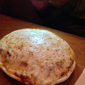 Vince's Spaghetti - Spaghetti with meat sauce and baked provolone. - Italian Near Me - Rancho Cucamonga, California Vince's Spaghetti - Spaghetti with meat sauce and baked provolone. - Italian Near Me - Rancho Cucamonga, California