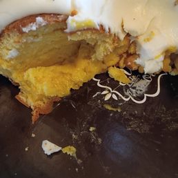 The cake was raw. We didn't realize it until after we served the slices as we got a closer look at it. It was completely raw on the center.