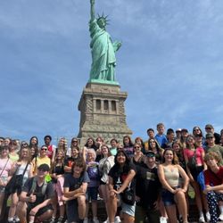 Educational Travel Services - Our group at the Statue of Liberty, June 2024.