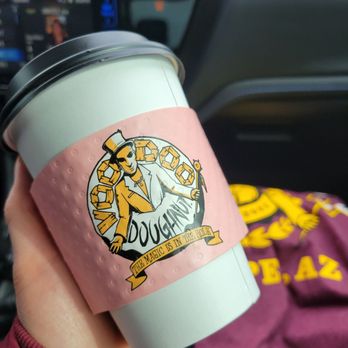 Voodoo Doughnut - My coffee and my new Voodoo shirt. Pass on their coffee. - Donuts Near Me - Tempe, Arizona