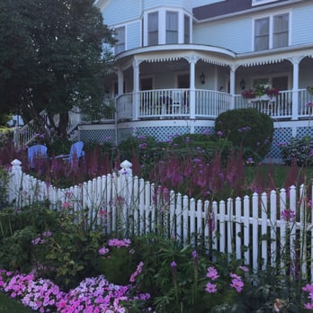 Metivier Inn - Front porch is the best place to people watch locals biking by, horses with tourist going by, reading a book or eating breakfast. - Hotels Near Me - Mackinac Island, Michigan Metivier Inn - Front porch is the best place to people watch locals biking by, horses with tourist going by, reading a book or eating breakfast. - Hotels Near Me - Mackinac Island, Michigan