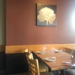 woman sitting at a table woman sitting at a table