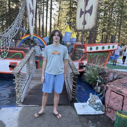 Magic Carpet Golf - A ship over a little water.