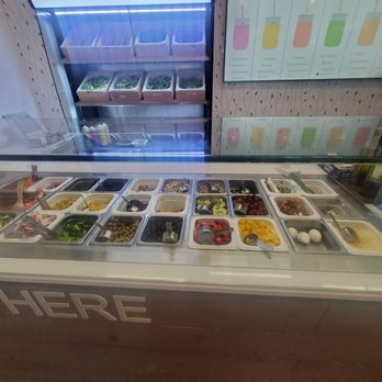 Greenbeat - a display of a variety of salads - Salad Near Me - Orlando, Florida Greenbeat - a display of a variety of salads - Salad Near Me - Orlando, Florida