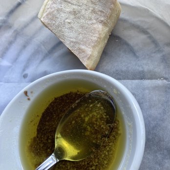 Cafe Murano - Bread and balsamic oil before our pizza came out - Italian Near Me - Altamonte Springs, Florida Cafe Murano - Bread and balsamic oil before our pizza came out - Italian Near Me - Altamonte Springs, Florida