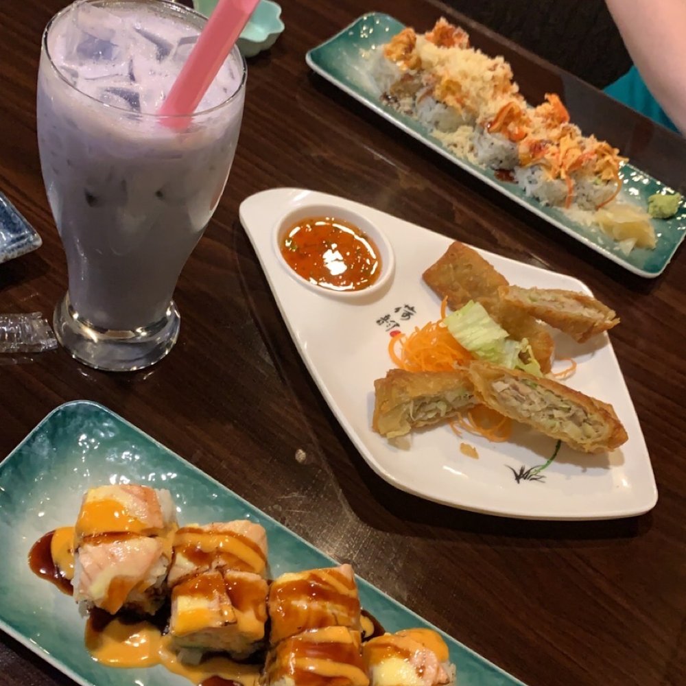 Crazy salmon roll with taro milk tea and Volcano roll with brown sugar milk tea. Eggrolls appetizer