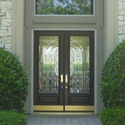 The Texas Door Expert - Double-hung mahogany entry door with designer glass.