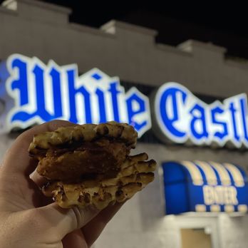 White Castle - a hand holding a half eaten sandwich - Fast Food Near Me - Indianapolis, Indiana White Castle - a hand holding a half eaten sandwich - Fast Food Near Me - Indianapolis, Indiana
