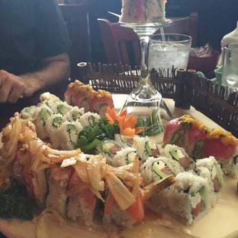 Hon Sushi - bottom Salmon tataki roll, Phili roll on the right, Cali on left, and Waikiki roll all the way in the back on top of stand too. - Sushi Bars Near Me - Carrollton, Texas Hon Sushi - bottom Salmon tataki roll, Phili roll on the right, Cali on left, and Waikiki roll all the way in the back on top of stand too. - Sushi Bars Near Me - Carrollton, Texas