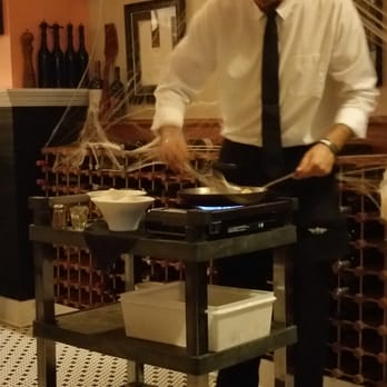 Pisces Rising - Server preparing our bananas foster - Seafood Near Me - Mount Dora, Florida Pisces Rising - Server preparing our bananas foster - Seafood Near Me - Mount Dora, Florida