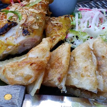 Temsib Eatery & Bar - Gai yang gorlek - a Southern Thai-style grilled chicken - Thai Near Me - Bellevue, Washington
