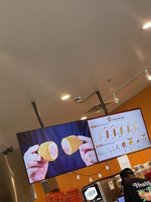 Two Hands Corn Dogs by null