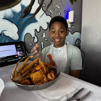 Crab City - My nephew getting his crab boil for his Birthday! - Cajun/Creole Near Me - San Diego, California Crab City - My nephew getting his crab boil for his Birthday! - Cajun/Creole Near Me - San Diego, California
