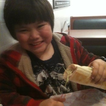 Jimmy John's - a young boy eating a sandwich - Sandwiches Near Me - Joplin, Missouri